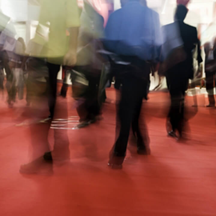 People walking on a red carpet