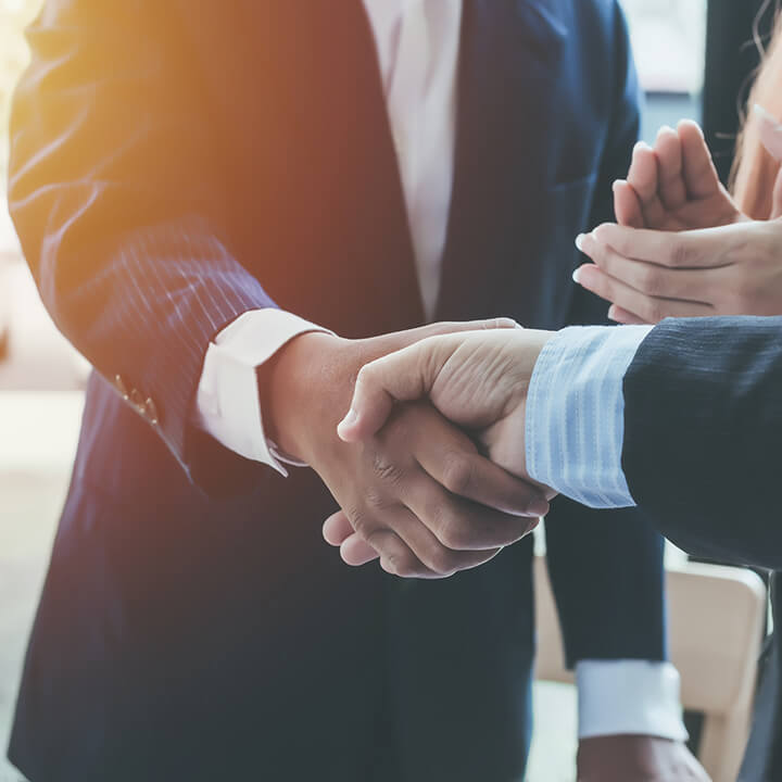 Business shaking hands. Business executives to congratulate the joint.