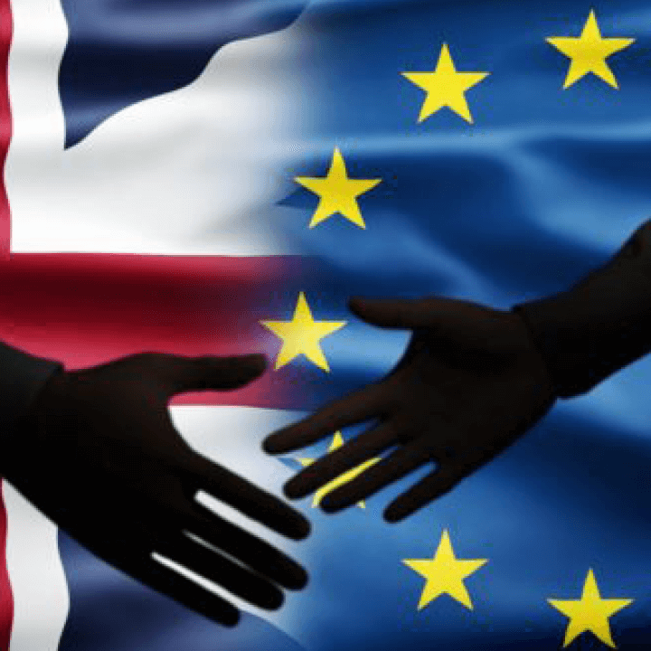 hands shaking over the Brexit flag