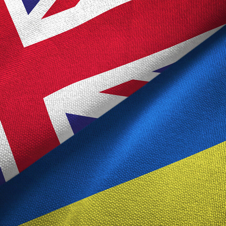 Ukraine-and-United-Kingdom-two-flags-together-realations-textile-cloth-fabric-texture