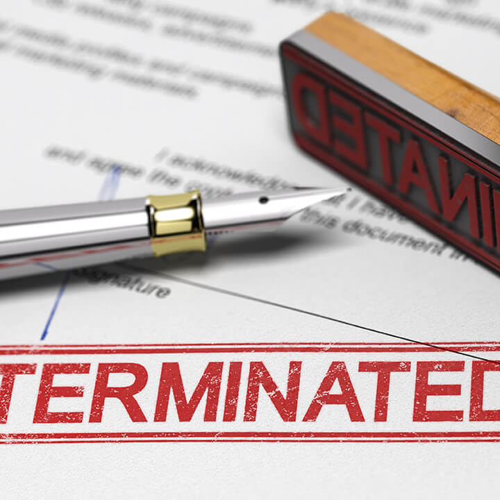 Termination-of-contract-agreement.-Word-Terminated-printed-on-a-document-