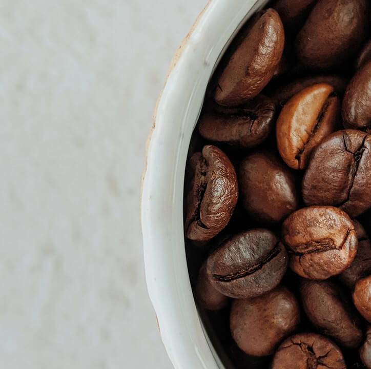 Coffee beans in a cup