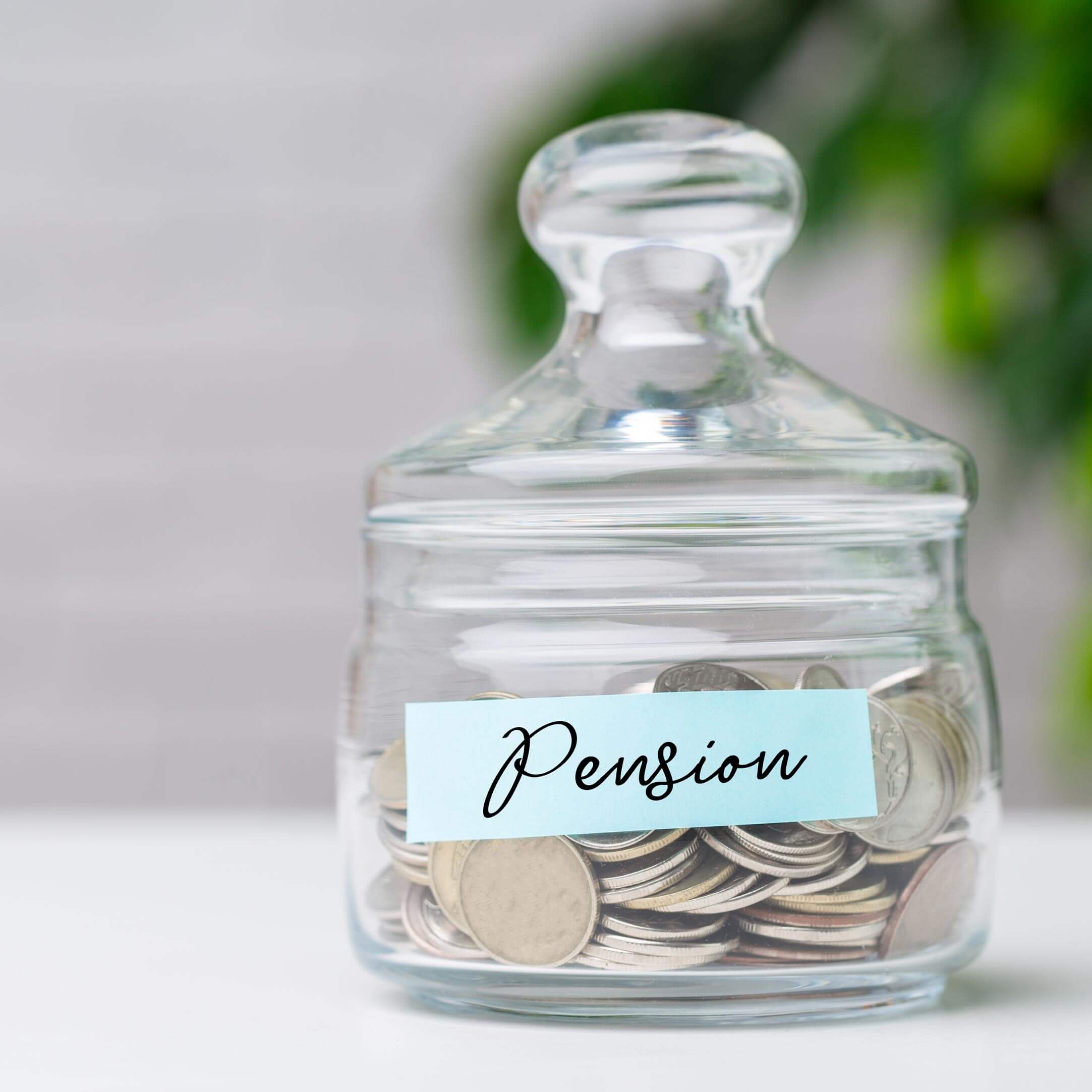 An image of a jar with coins in it, labelled "pension". A visual metaphor for the topic of this article, Pensions (Extension of Automatic Enrolment) Act 2023.