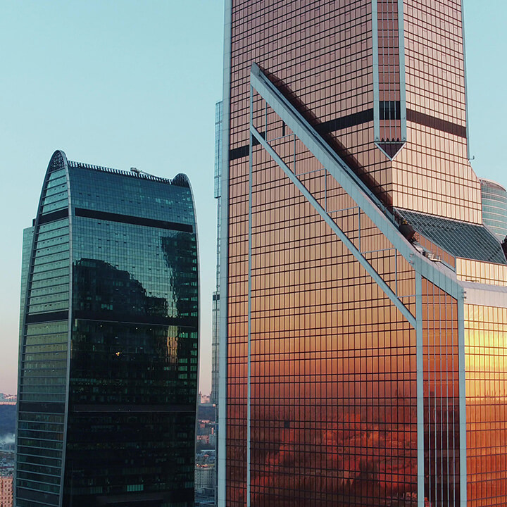 An image of two sky scrapers. A visual metaphor for the topic of this article, The Economic Crime and Corporate Transparency Act.