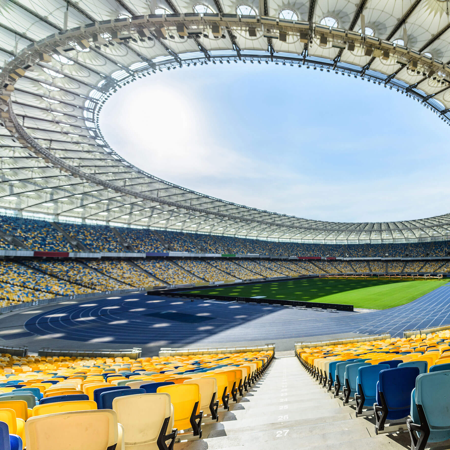 An image of a football stadium being constructed, a visual metaphor for the topic of this article, Navigating Stadium Development Projects for Football Clubs
