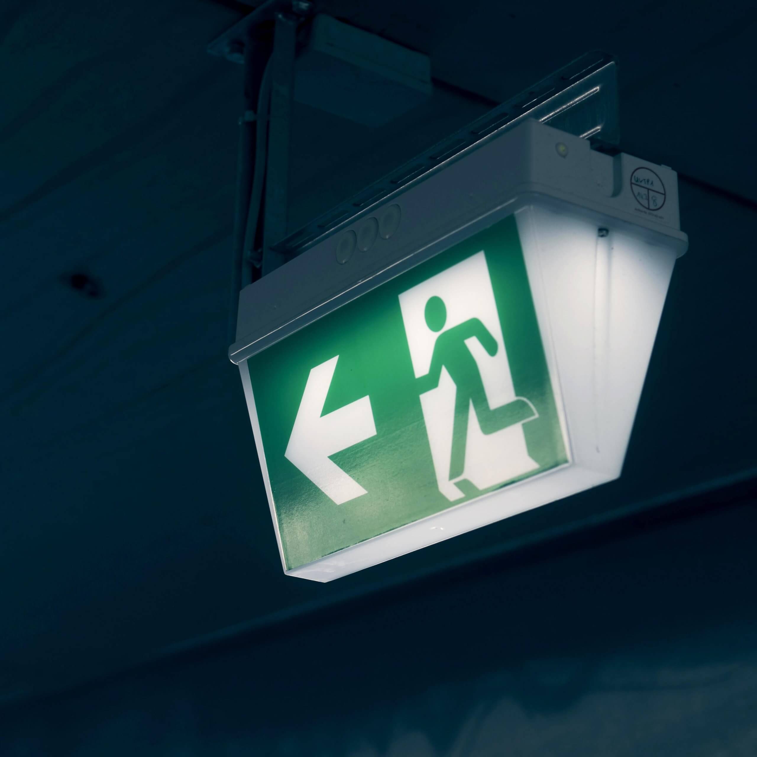 An image of a emergency exit sign, a visual metaphor for the topic of this piece What if a player wants out? Jordan Henderson in Saudi Arabia